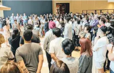  ?? | REUTERS ?? GOOGLE employees gather in a common area to attend the Google Walkout in Singapore yesterday, in this picture obtained from social media.