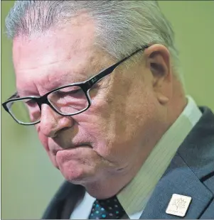 ?? CP PHOTO ?? Public Safety and Emergency Preparedne­ss Minister Ralph Goodale speaks with media before appearing at the Senate National Security and Defence committee in Ottawa, Monday.