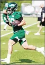  ??  ?? New York Jets’ Valentine Holmes participat­es during practice at the NFL football team’s training camp in Florham Park, New
Jersey on July 25, 2019. (AP)