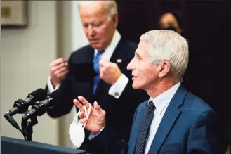  ?? Demetrius Freeman / Washington Post ?? Anthony Fauci, the chief medical adviser to President Joe Biden, answers questions on the omicron variant Monday at the White House.