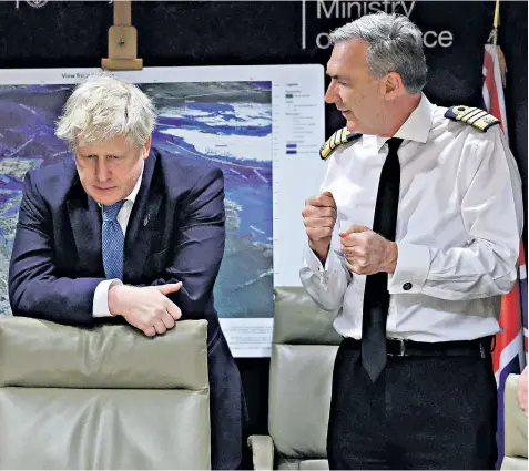  ?? ?? Boris Johnson is updated on the situation in Ukraine by Admiral Sir Tony Radakin, the Chief of the Defence Staff, at a meeting at the Ministry of Defence