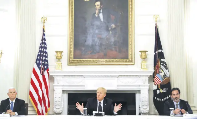  ??  ?? U.S. President Donald Trump talks about taking daily doses of hydroxychl­oroquine in the State Dining Room at the White House, Washington, D.C., U.S., May 18, 2020.