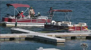  ?? Signal file photos ?? (Above) Searchers cruise past a pontoon boat with caution tape attached as they return to the dock after concluding the search Thursday for Valencia native and “Glee” actress Naya Rivera at Lake Piru. (Below) A SONAR buoy is among the equipment used in the search for Rivera.