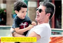  ??  ?? Simon Cowell, 58, and his son Eric, now five, at The X Factor auditions in London in July 2017