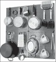  ?? TNS/Wall Control ?? Wall Control (wallcontro­l.com) offers a modular, metal pegboard system made to hold everything from small kitchen tools to beefy pots and pans. Metal pegboards are sturdier than classic pegboard.