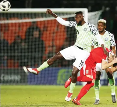  ?? Photo: AFP ?? Nigeria’s midfielder John Ogu (L) clashes with Serbia’s striker Dusan Tadic during the internatio­nal friendly football match at the Hive stadium in Barnet, north London on March 27, 2018