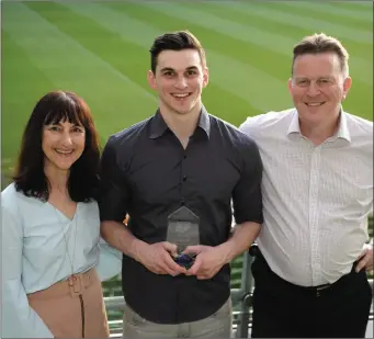  ??  ?? Jack Keating, Greystones RFC, pictured with parents Caroline and Stephen Keating during the Ulster Bank League Awards at the Aviva Stadium in Dublin.