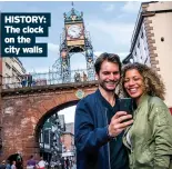  ??  ?? HISTORY: The clock on the city walls