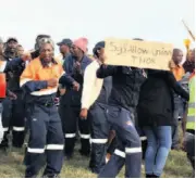  ??  ?? Protestors vent their frustratio­ns at the port entrance