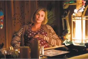  ?? Kimberly French / Focus Features ?? Charlize Theron is Marlo, a harried mom whose brother provides a night nanny named Tully to help with her three kids and attend to her needs as well.