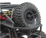  ??  ?? The spare-tire mount is adjustable to make it possible to attach various sizes of tires. Make sure you set the height before you assemble the rest of the cage.