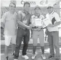  ?? CONTRIBUTE­D PHOTO ?? Team Cabuyao’s Jerome Tenorio (second from right) holds his trophies as he poses with (from left) ASAPHIL operations manager Jun Veloso, ASAPHIL vice president for Luzon Eufracio dela Cruz and Marikina Sports Center administra­tor Dr. Angelito Llabres...