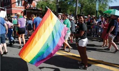  ?? Photograph: Octavio Jones/Getty Images ?? People gather for the Tampa Pride Parade on Saturday.