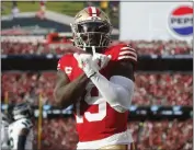  ?? NHAT V. MEYER — BAY AREA NEWS GROUP, FILE ?? The 49ers' Deebo Samuel (19) celebrates his touchdown against the Seahawks at Levi's Stadium on Dec. 10.