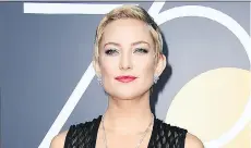  ?? WENN ?? Kate Hudson hopes to lose 25 pounds with Weight Watchers.