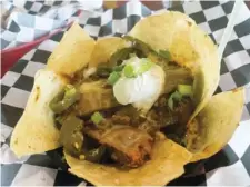  ?? ?? The tamale pie is a customer favorite at Hot Tamale Heaven and Grille in Greenville, Miss.