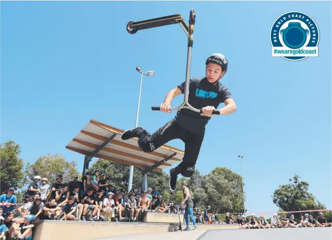  ?? Picture: RICHARD GOSLING ?? JonMarco Gaydos from New Jersey wows the Pizzey Park crowd with some tricks at the Scooter Hut Pro Series Grand Final.