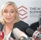  ?? AP ?? The French far-right party leader Marine Le Pen attends a news conference with reporters in Warsaw, Poland, on Saturday.