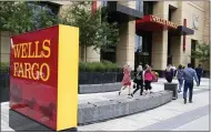  ?? JIM MONE — ASSOCIATED PRESS ?? A lawsuit alleges that Wells Fargo violated the federal Fair Housing Act and the California Fair Employment and Housing Act.