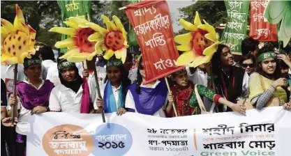  ??  ?? DHAKA: Bangladesh people attend a Climate March rally expressing solidarity with Global Climate March, in Dhaka yesterday. Today, hours before world leaders meet at the Paris Climate Summit, the Global Climate March will take place to ask political...