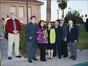  ??  ?? Calexico Community services Director sandra tauler (third from left) was honored on tuesday by the city for her 28 years of service to the community and its libraries. JULIO MORALES PHOTO