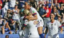  ?? ALESSANDRA TARANTINO — THE ASSOCIATED PRESS ?? US players celebrate after teammate Julie Ertz scored their side’s second goal during the Women’s World Cup Group F match between United States and Chile at Parc des Princes in Paris, France, Sunday.