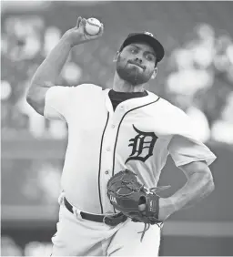  ?? RICK OSENTOSKI/USA TODAY SPORTS ?? Tigers starting pitcher Michael Fulmer, seen delivering against the Indians on June 8, is near the top if the Yankees’ wish list, but New York is balking at the hefty prospect price tag.