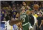  ?? JED JACOBSOHN — THE ASSOCIATED PRESS ?? The Celtics’ Jayson Tatum loses the ball while being defended by the Warriors’ Draymond Green and Stephen Curry on June 5in San Francisco.