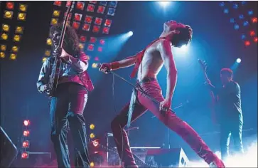  ?? Alex Bailey 20th Century Fox ?? RAMI MALEK, center right, as Freddie Mercury and Gwilym Lee as Brian May in “Bohemian Rhapsody.”