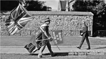  ?? — AFP photo ?? Anti-Brexit campaigner Steve Bray walks outside the Houses of Parliament in central London.