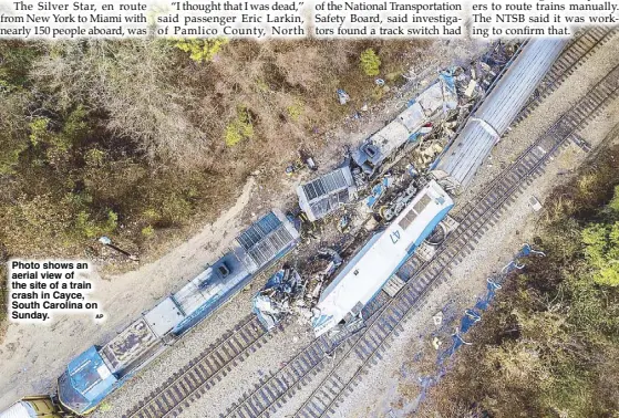  ??  ?? Photo shows an aerial view of the site of a train crash in Cayce, South Carolina on Sunday.