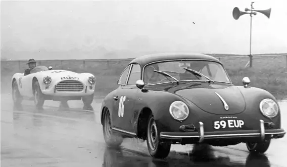  ??  ?? Below: A very wet outing in the Carrera at what we believe is Thruxton (hard to tell from the background in those conditions!). Pity the poor driver of the AC Ace…