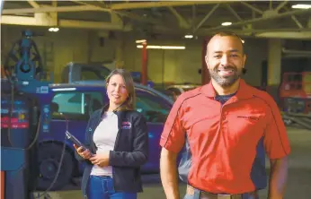  ?? MONICA CABRERA/THE MORNING CALL PHOTOS ?? Nelson and Carolina Tavarez stand inside Austin’s Auto Service in the former Coca-Cola bottling plant in west Bethlehem, which the couple purchased this year with plans to turn it into a mixed-use commercial property. The Upper Macungie Township couple also own Austin’s Auto Service.“For me, it was keeping the business going,” Nelson Tavarez says of the reason behind the couple’s decision to buy the neighborin­g plant, much of which had been unused and in disrepair for years.