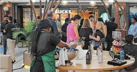  ??  ?? THE Starbucks opening event at the Waterfront featuring host Riyadh Moussa. | Tracey Adams African News Agency (ANA)