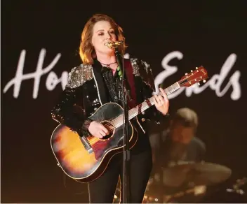  ?? THE ASSOCIATED PRESS ?? After Brandi Carlile performed The Joke at the Grammys on Sunday, the song raced to No. 2 on the iTunes digital songs chart.