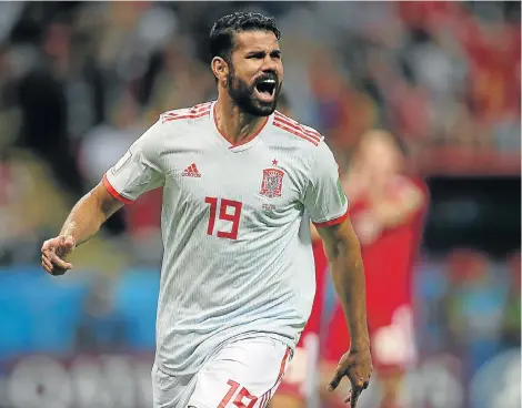  ?? Picture: ROMAN KRUCHININ/AFP PHOTO ?? RIGHT SPOT, RIGHT TIME: Spanish forward Diego Costa celebrates his freak goal during the World Cup Group B football match against Iran at the Kazan Arena in Kazan, Russia, yesterday