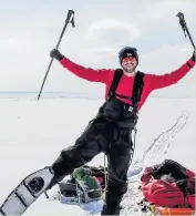  ??  ?? Ash Routen, a Loughborou­gh University academic, celebrates completing the epic walk.