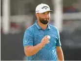  ?? RICHARD HEATHCOTE/GETTY ?? World No. 1 Jon Rahm shot an opening-round 7-under 65 to take a two-stroke lead at the Arnold Palmer Invitation­al on Thursday in Orlando.