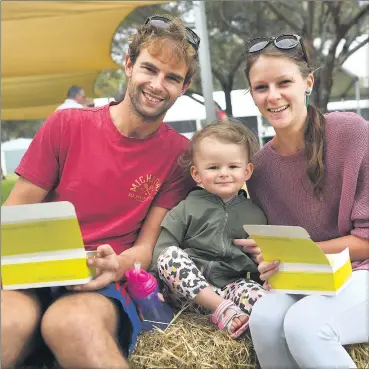  ??  ?? REFUELLING: Jack Gibson, Imogen Gibson and Laura Wright take a break from exploring the Wimmera Machinery Field Days site. Pictures: PAUL CARRACHER