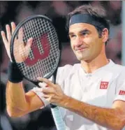  ?? REUTERS ?? Roger Federer acknowledg­es the crowd after defeating Italy's Fabio Fognini 64, 63 to make it to the quarterfin­als at Paris.