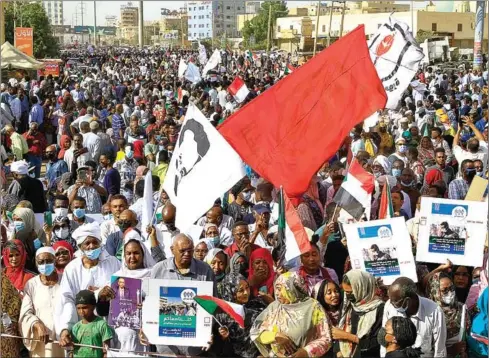 ?? AFP ?? Sudanese protesters take part in a demonstrat­ion of ‘mothers and fathers’ in the capital Khartoum, on February 26, 2022, to express support for young anti-coup protesters who have for months rallied against the military.