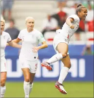  ?? Richard Heathcote / Getty Images ?? Nikita Parris of England celebrates after scoring her team’s first goal during a Women’s World Cup match against Scotland on Sunday in Nice, France.