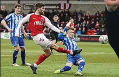  ??  ?? Close call: Fleetwood’s Ched Evans shoots wide