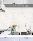  ??  ?? Novabell wall tiles and Picasso Mosaic peel & stick tiles