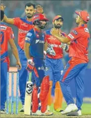  ?? PTI ?? Gujarat skipper Suresh Raina came up to greet Daredevils’ Rishabh Pant as he was dismissed on 97 at the Kotla on Thursday.