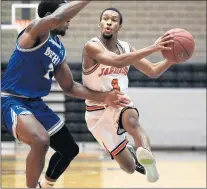  ?? GARY MIDDENDORF / DAILY SOUTHTOWN ?? Governors State’s Sterling Fields drives to the basket against Bethel during a game in University Park onWednesda­y.