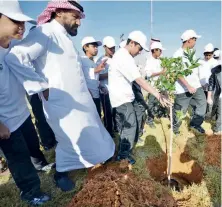  ?? AN archives ?? Right: Local planting initiative­s have been launched around the Kingdom, including in the Eastern Province; below: Community engagement is a key goal of Saudi green efforts.