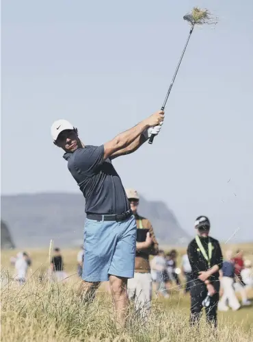  ??  ?? 0 Event host Rory Mcilroy in pro- am action yesterday at the Dubai Duty Free Irish Open at Ballyliffi­n.