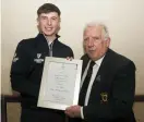  ??  ?? Leinster Golf Chairman John Ferriter with U16Orderof­Meritwinne­rAlex Maguire (Laytown & Bettystown)