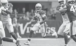  ??  ?? Cardinals running back David Johnson (31) carries the ball against the Minnesota Vikings on Sunday in Minneapoli­s.